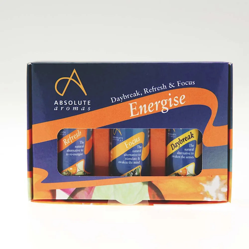 A blue and orange Absolute Aromas "Energise" gift box featuring a cutout window that reveals three essential oil blends: Refresh, Focus, and Daybreak.