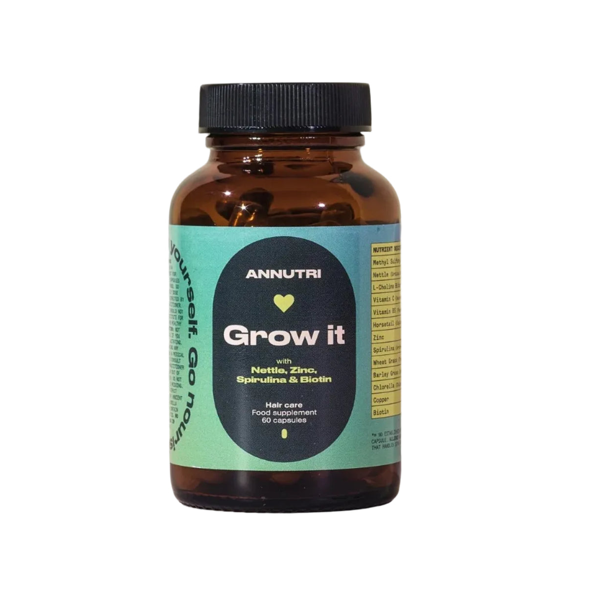 Brown supplement bottle with a green label on a light beige background