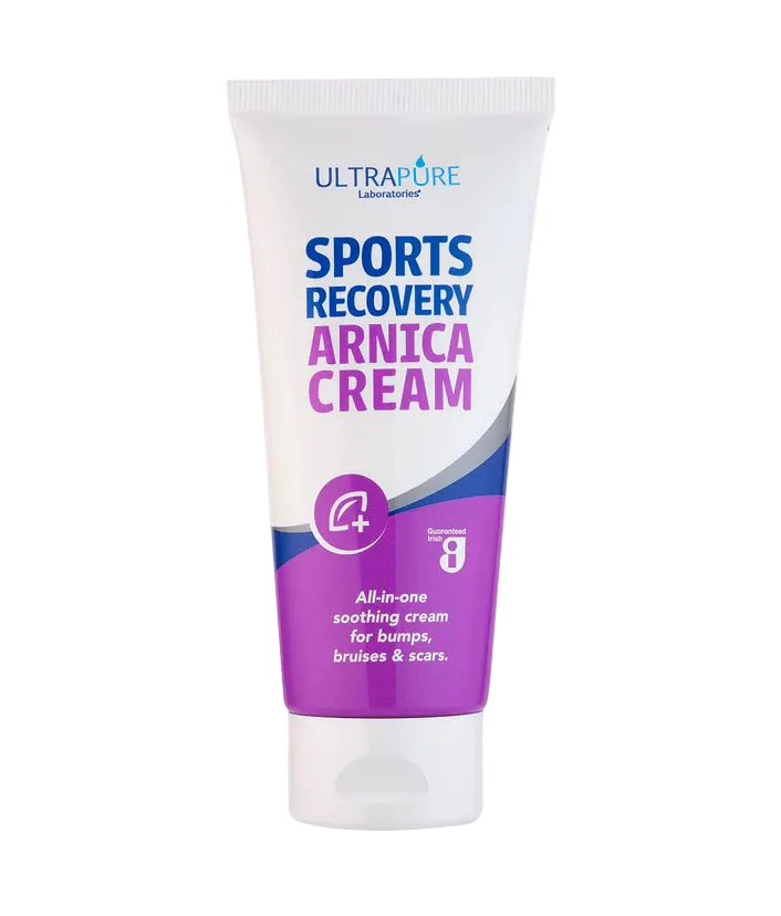A white squeeze tube of ULTRAPURE Laboratories Sports Recovery Arnica Cream with purple and blue branding, labeled as an all-in-one soothing cream for bumps, bruises, and scars.