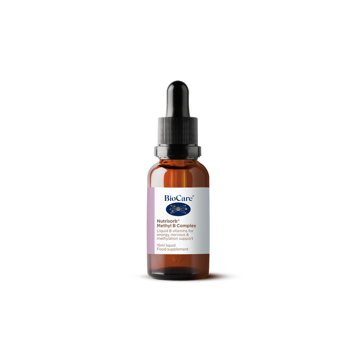 A 15ml amber glass dropper bottle of BioCare Nutrisorb Methyl B Complex liquid B vitamins for energy, nervous, and methylation support, featuring a white and purple label, isolated on a white background.