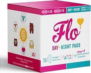 A box of Flo Day & Night Pads, size 15, featuring a white and pink design with illustrations of underwear and a yellow heart logo.