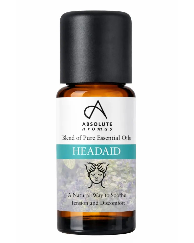 Absolute Aromas Headaid is a natural essential oil blend designed to soothe tension and discomfort, packaged in an amber glass bottle with a black cap.