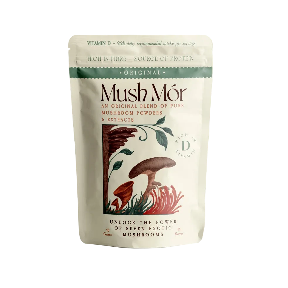 Mush Mór mushroom powder pouch on a pedestal with an abstract botanical wave background.