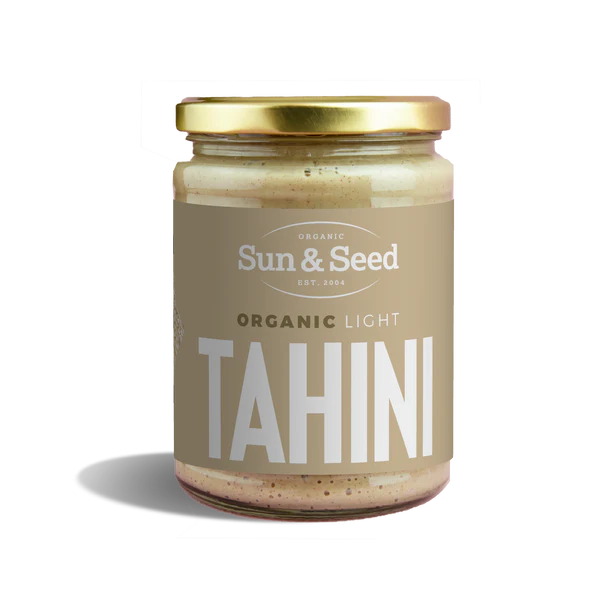 Sun & Seed Organic Light Tahini glass jar with a gold lid.