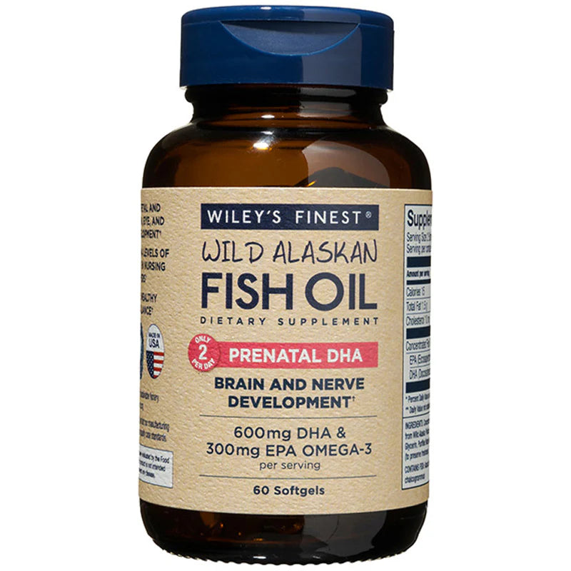 A dark amber bottle of Wiley's Finest Wild Alaskan Fish Oil dietary supplement with a blue cap. The label highlights "Prenatal DHA" for brain and nerve development, containing 600mg DHA and 300mg EPA Omega-3 per serving of 2 softgels.