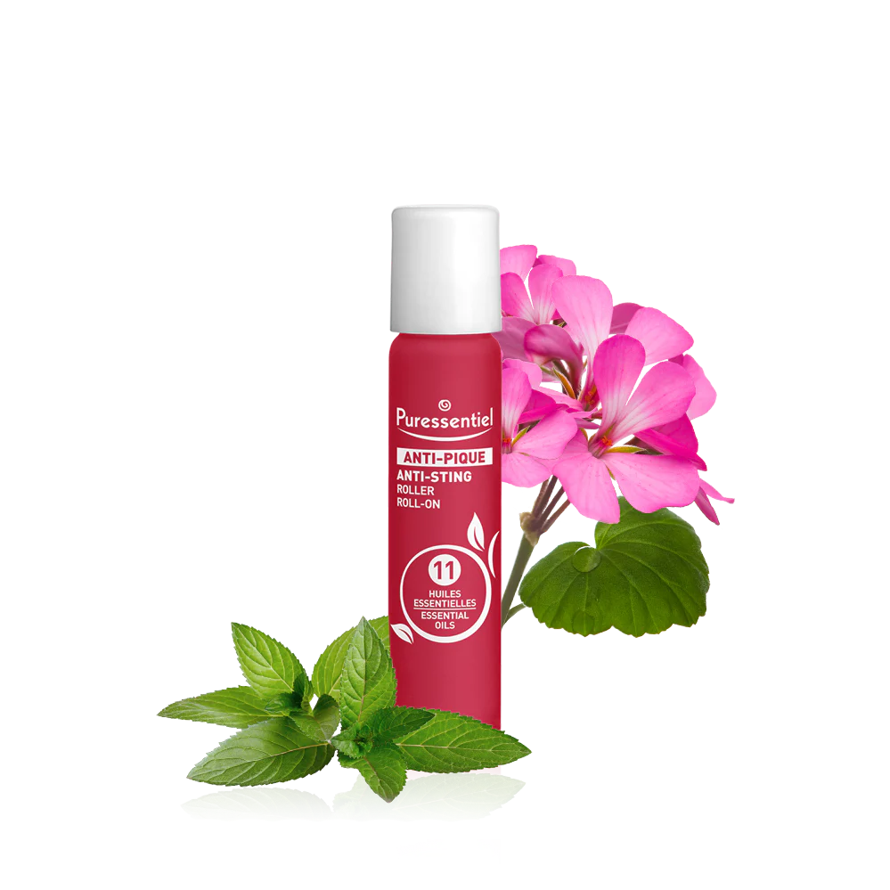 Puressentiel Anti-Pique anti-sting roll-on with pink flowers and mint leaves.