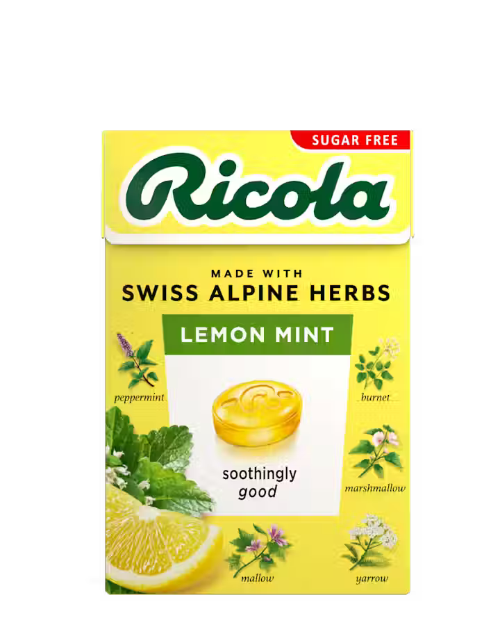 Yellow sugar-free Ricola Lemon Mint herb drops box with botanical illustrations.