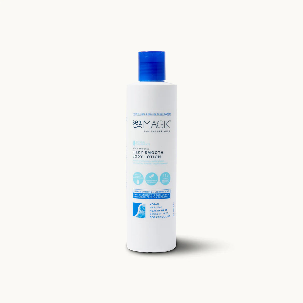 Tall white bottle of Sea Magik Silky Smooth Body Lotion with a blue dispenser cap and label.