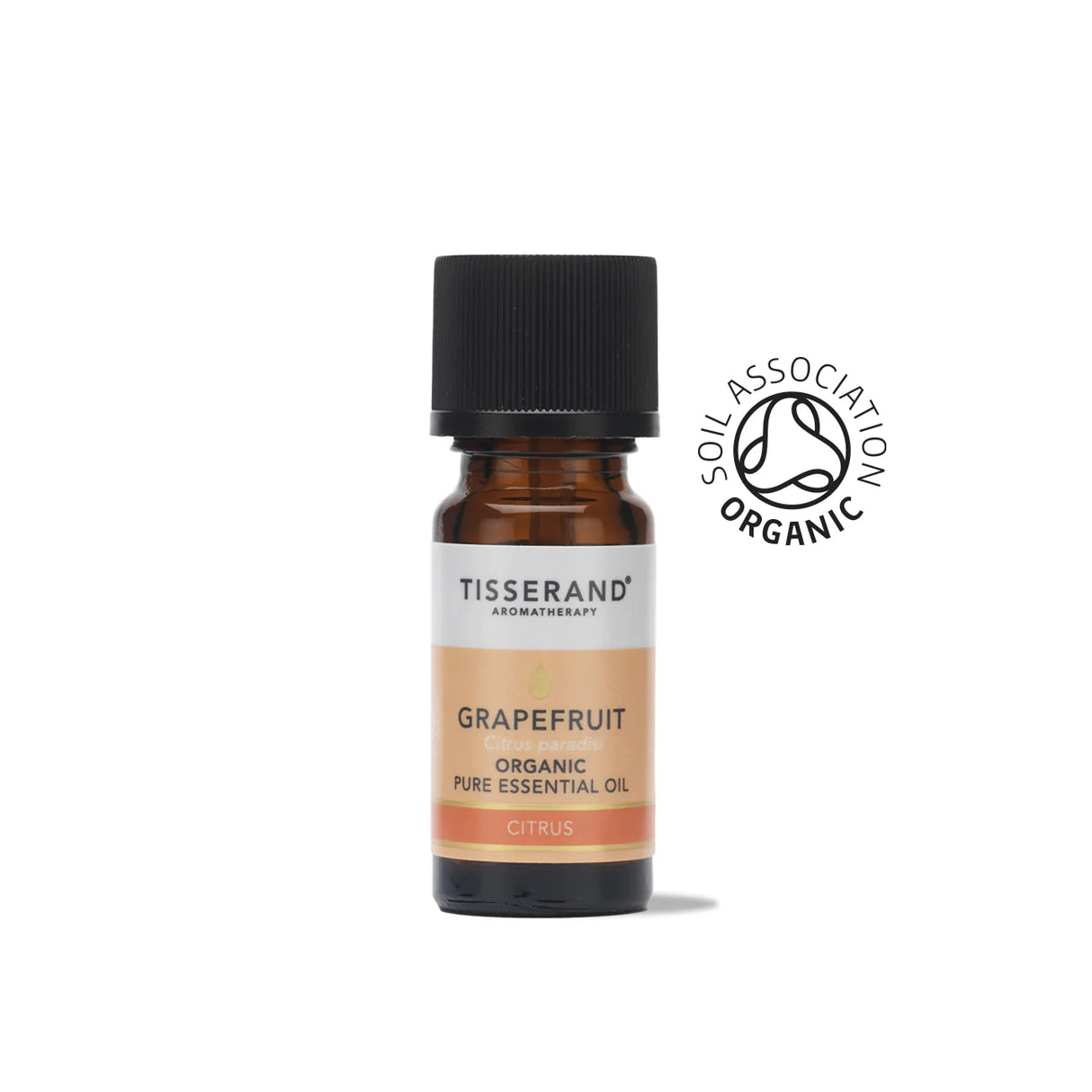 A small amber glass bottle of Tisserand Grapefruit organic pure essential oil with a peach and white label and a black cap.