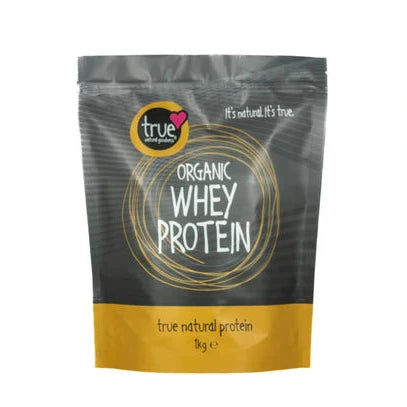 A 1kg grey and yellow resealable pouch of True Organic Whey Protein featuring a yellow circular logo and white text.