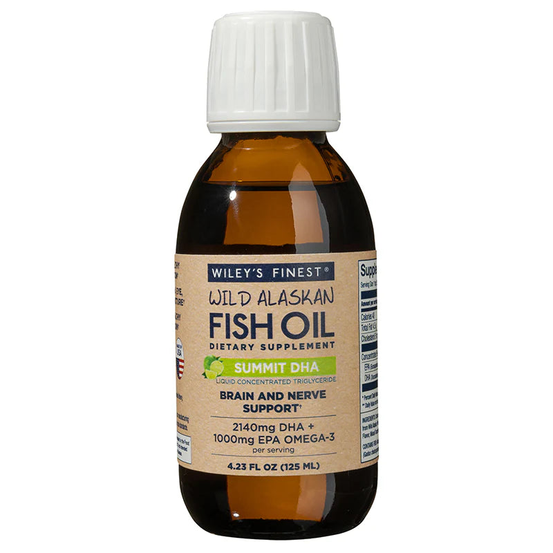 A 4.23 fl oz amber glass bottle of Wiley's Finest Wild Alaskan Fish Oil Summit DHA dietary supplement, featuring a tan label with lime illustrations and text highlighting brain and nerve support.