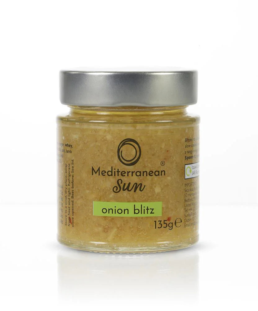 Jar of Mediterranean Sun "Onion Blitz" with a silver lid. The label is clear, showing tan onion paste inside. Weight: 135g. Simple and fresh design.