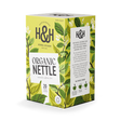 Box of Heath & Heather Organic Nettle Tea featuring green leaves and a butterfly design. Labeled "Naturally Caffeine Free". Contains 20 teabags.