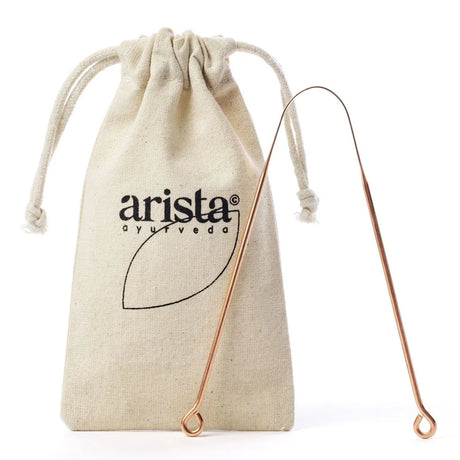 "Arista Ayurveda copper tongue scraper, shown with its accompanying branded natural cotton travel pouch."