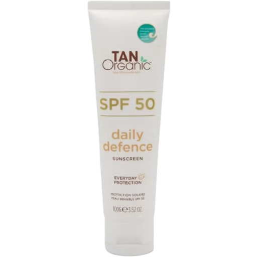 TanOrganic Daily Defence Sunscreen: White 100g tube of TanOrganic SPF 50 daily defence sunscreen, featuring branding indicating everyday protection and suitable for sensitive skin.