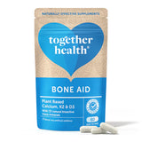 Together Health Bone Aid: A resealable pouch of Together Health Bone Aid, a plant-based food supplement containing Calcium, K2, and D3 along with 72 natural bioactive trace minerals. The packaging emphasizes that it contains no artificial additives and includes 60 easy-to-take capsules.