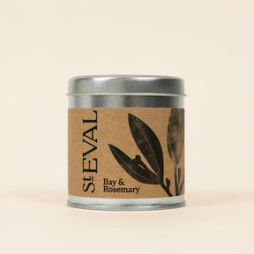 St. Eval Bay & Rosemary scented candle in a signature tin, featuring a natural kraft paper label with a botanical illustration.