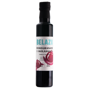 Belazu Pomegranate Molasses, a rich, vibrant, and tangy syrup from Turkey with a balanced sweetness, perfect for finishing and glazing.