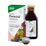 Salus Floravital liquid iron and vitamin formula with measuring cup.