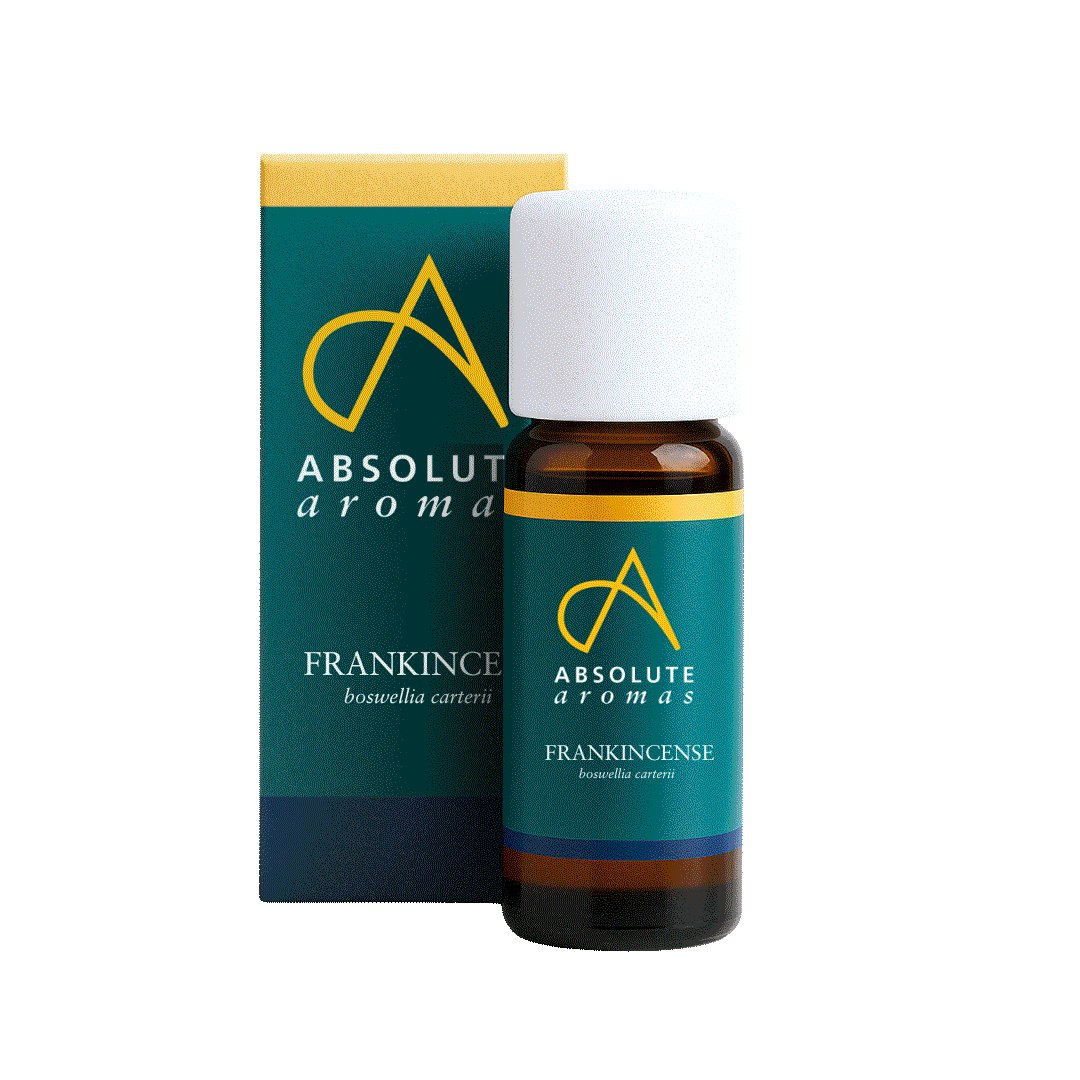 Bottle and box of Absolute Aromas Frankincense oil on a white background