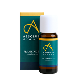 Bottle and box of Absolute Aromas Frankincense oil on a white background