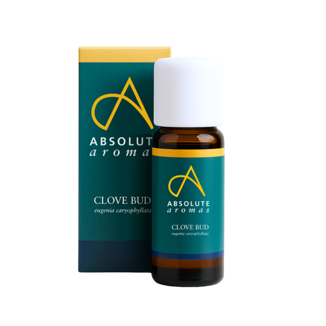 A small amber glass bottle and matching teal box of Absolute Aromas Clove Bud essential oil, with a white cap and the botanical name Eugenia caryophyllata shown on the label.