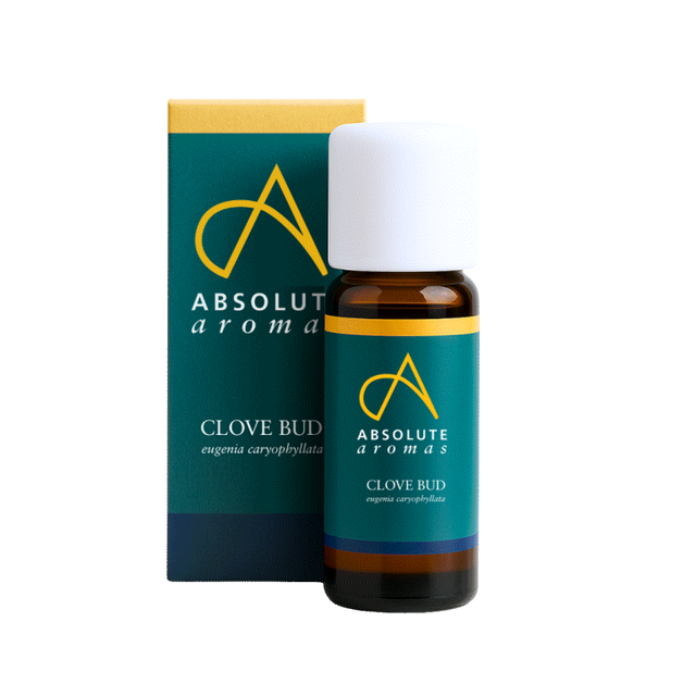 A small amber glass bottle and matching teal box of Absolute Aromas Clove Bud essential oil, with a white cap and the botanical name Eugenia caryophyllata shown on the label.