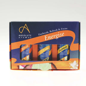 A blue and orange Absolute Aromas "Energise" gift box featuring a cutout window that reveals three essential oil blends: Refresh, Focus, and Daybreak.
