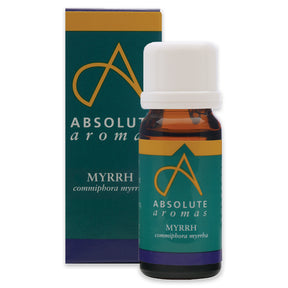 Amber glass bottle of Myrrh essential oil with a white cap next to its teal and gold branded packaging.