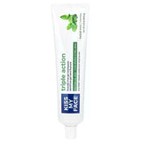 Tube of Kiss My Face Triple Action Fluoride-Free Gel Toothpaste in Herbal Mint flavor.