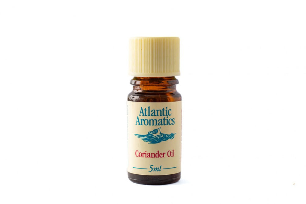 A 5ml amber glass bottle of Atlantic Aromatics Coriander Oil with a cream-colored cap against a white background.