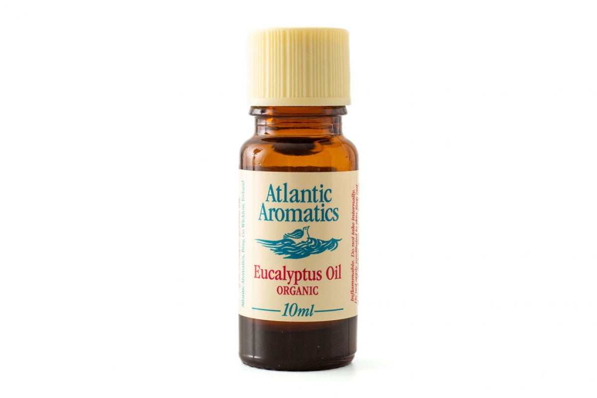 A 10ml amber glass bottle of Atlantic Aromatics Organic Eucalyptus Oil with a cream-colored ribbed cap on a white background.