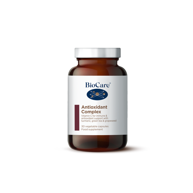 A 30-capsule amber glass jar of BioCare Antioxidant Complex food supplement with a white and maroon label and silver cap, isolated on a white background.
