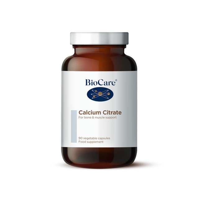 A 90-vegetable capsule amber glass jar of BioCare Calcium Citrate food supplement for bone and muscle support, featuring a white and light grey label and silver cap, isolated on a white background.