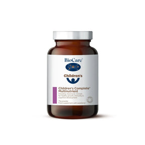 A 75g jar of BioCare Children's Complete Multinutrient powder food supplement with a white and purple label and silver cap, isolated on a white background.
