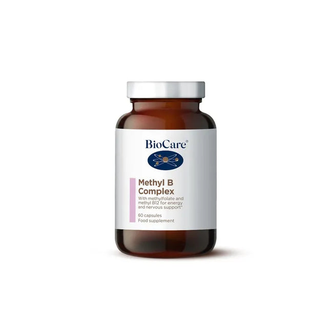 A 60-vegetable capsule amber glass jar of BioCare Methyl B Complex food supplement for energy, mental health, and hormone balance, featuring a white and purple label and silver cap, isolated on a white background.