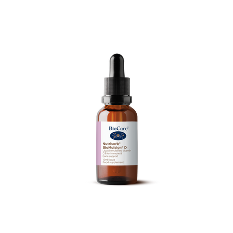 A 15ml amber glass dropper bottle of BioCare Nutrisorb BioMulsion D liquid emulsified vitamin D3 for immune and bone support, featuring a white and purple label, isolated on a black background.