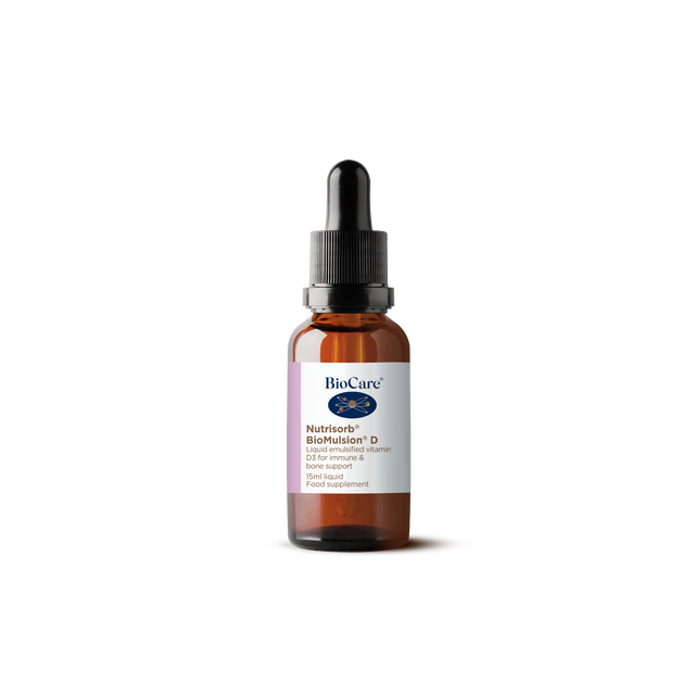 A 15ml amber glass dropper bottle of BioCare Nutrisorb BioMulsion D liquid emulsified vitamin D3 for immune and bone support, featuring a white and purple label, isolated on a black background.