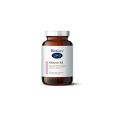 A 30-vegetable capsule amber glass jar of BioCare Vitamin B3 food supplement for energy, mental health, and wellbeing, featuring a white and light pink label and silver cap, isolated on a white background.