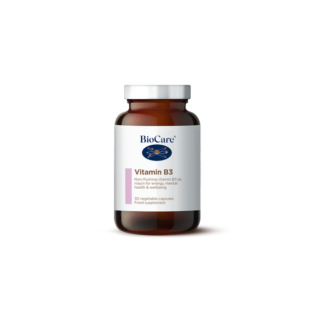 A 30-vegetable capsule amber glass jar of BioCare Vitamin B3 food supplement for energy, mental health, and wellbeing, featuring a white and light pink label and silver cap, isolated on a white background.