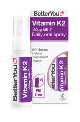 A bottle and box of BetterYou Vitamin K2 Daily Oral Spray, 180µg MK-7, peppermint flavored, featuring a white and purple color scheme.