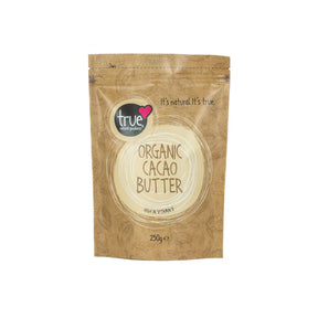 A 250g brown paper pouch of True Organic Cacao Butter featuring a cream-colored circular label and cacao bean illustrations.