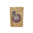 A 250g brown paper pouch of True Organic Cacao Nibs with a dark brown circular logo and cacao bean sketches.
