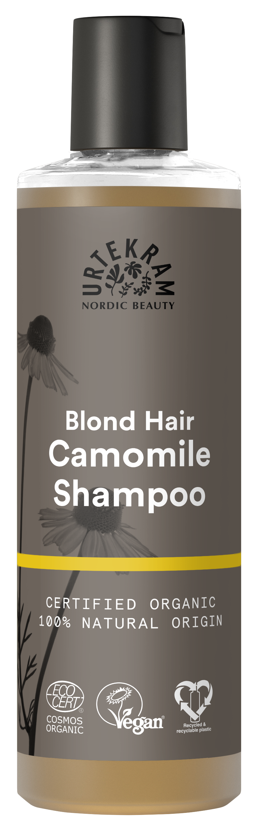 A tall bottle of Urtekram Camomile Shampoo for blond hair with a grey and brown label featuring camomile flower illustrations and a thin yellow horizontal stripe. The label indicates it is certified organic, 100% natural origin, and carries Vegan and Ecocert COSMOS Organic certifications.