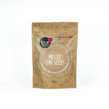 A 250g brown paper pouch of True Milled Chia Seeds with a tan circular label and subtle leaf illustrations.