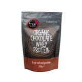 A 250g grey and brown resealable pouch of True Organic Chocolate Whey Protein featuring a reddish-brown circular logo and white text.