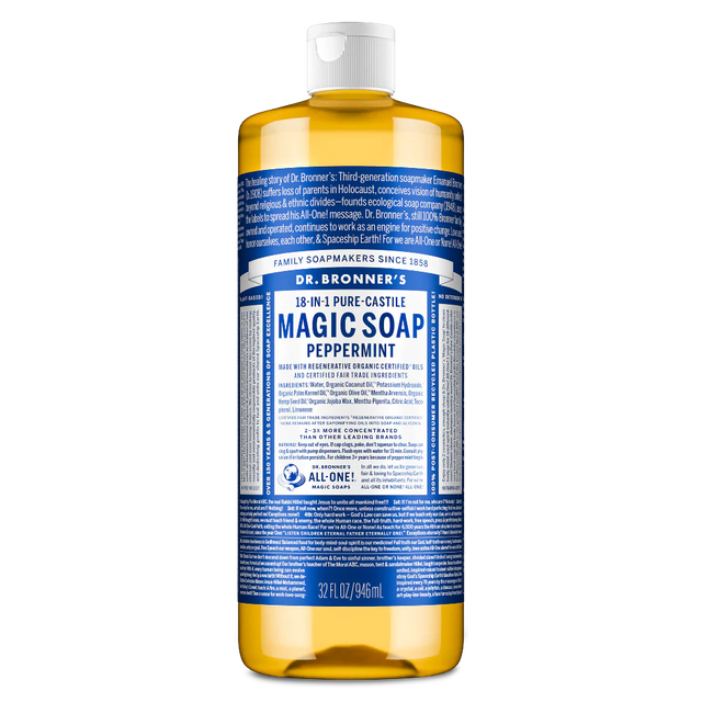 Dr. Bronner's 32 oz. bottle of Peppermint Pure-Castile Magic Soap. Blue and white label with bold text on a transparent bottle filled with amber liquid.