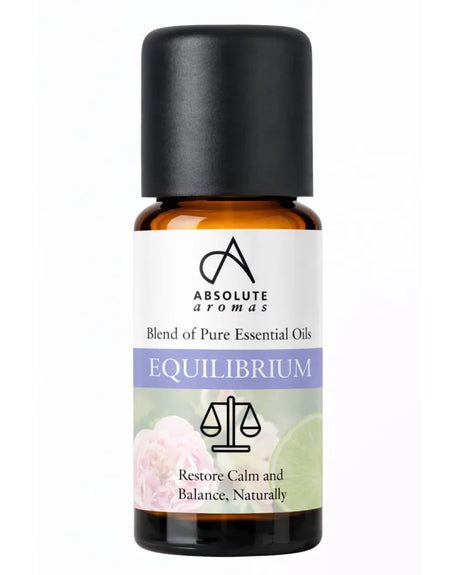 Absolute Aromas Equilibrium is a blend of pure essential oils designed to restore calm and balance naturally, packaged in an amber glass bottle with a black cap.
