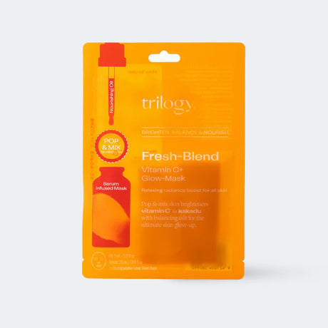 Trilogy Fresh-Blend Vitamin C glow mask sheet face mask packet in bright orange.