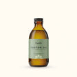 An amber glass bottle of Fushi Organic Fresh-Pressed 100% Pure Castor Oil.